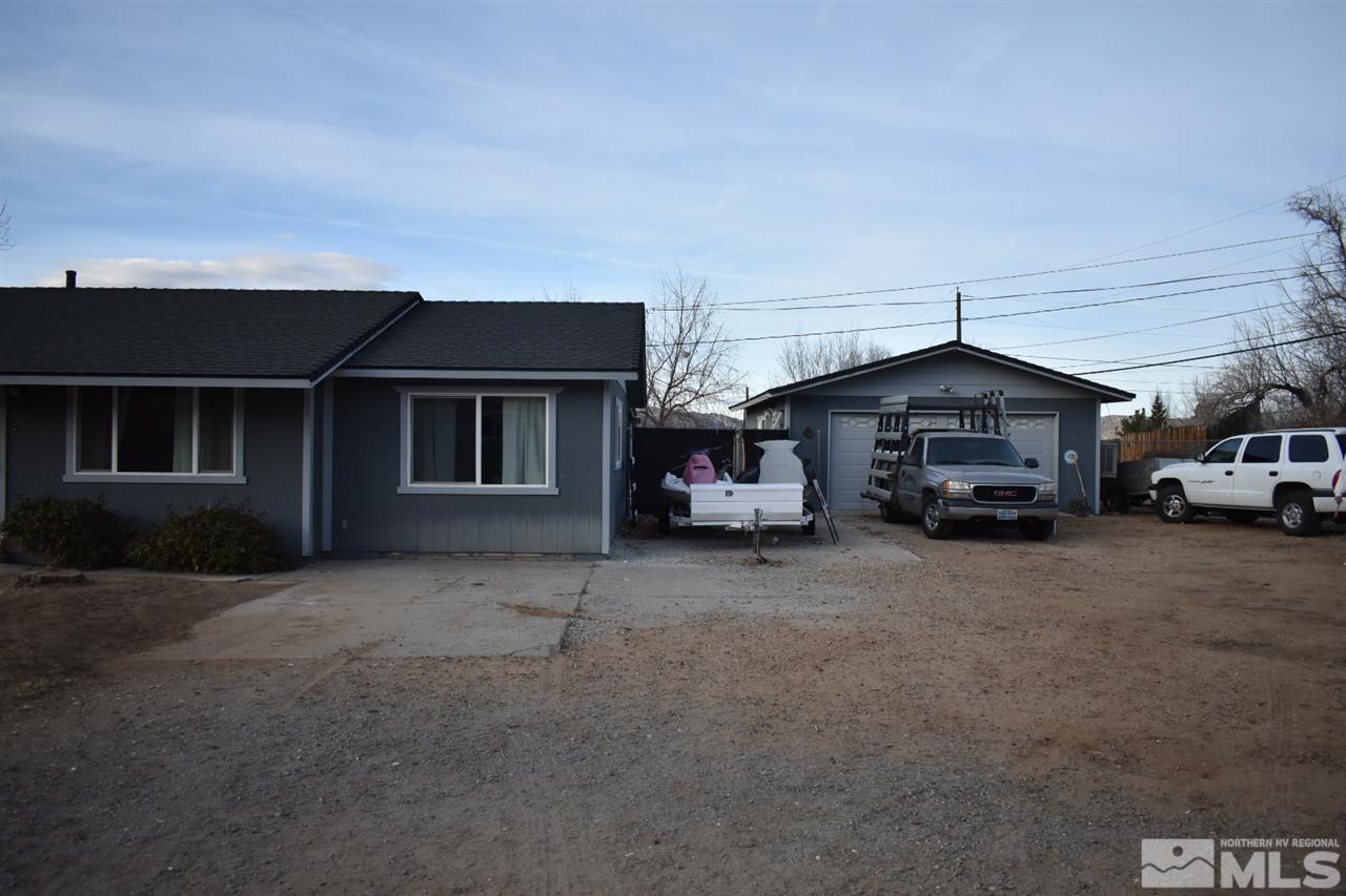 9355 Pagoda Way Reno, NV 89506 - Photo 2 of 18 a car parked in front of a house