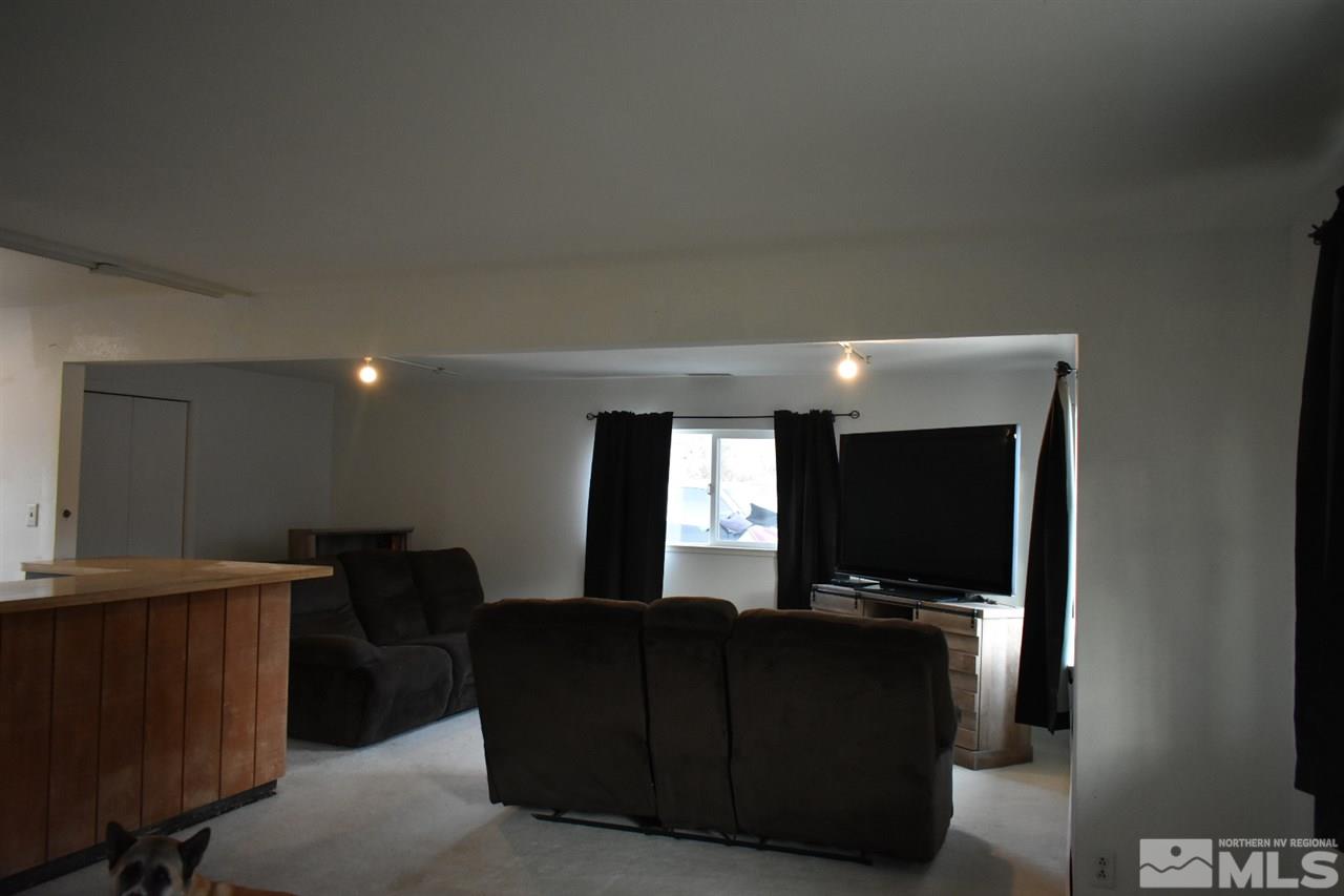 9355 Pagoda Way Reno, NV 89506 - Photo 5 of 18 a living room with furniture and a flat screen tv