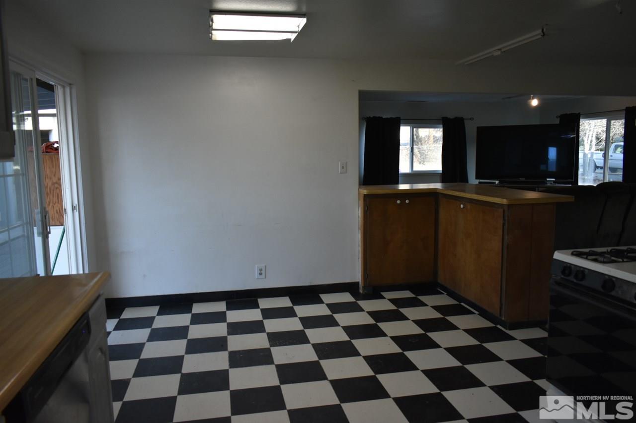 9355 Pagoda Way Reno, NV 89506 - Photo 6 of 18 a black and white checkered floor