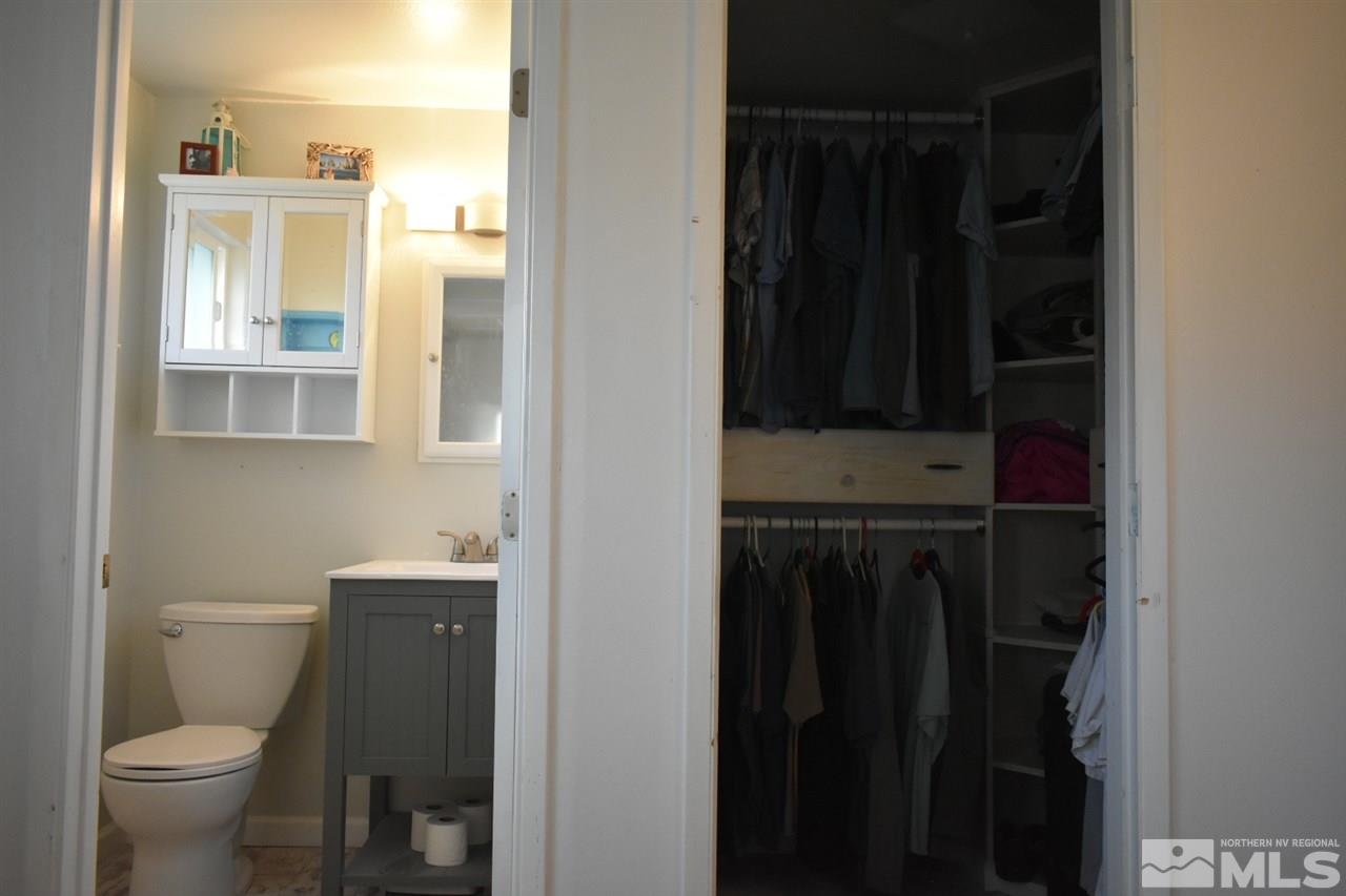 9355 Pagoda Way Reno, NV 89506 - Photo 10 of 18 a bathroom with a toilet and a sink