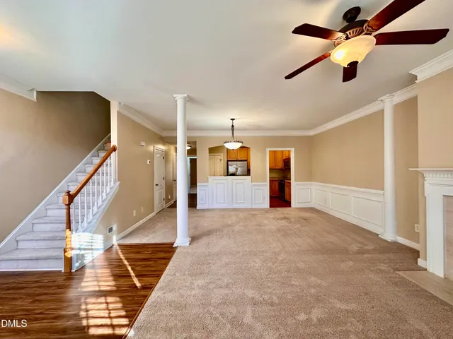 a view of a livingroom with a ceiling fan