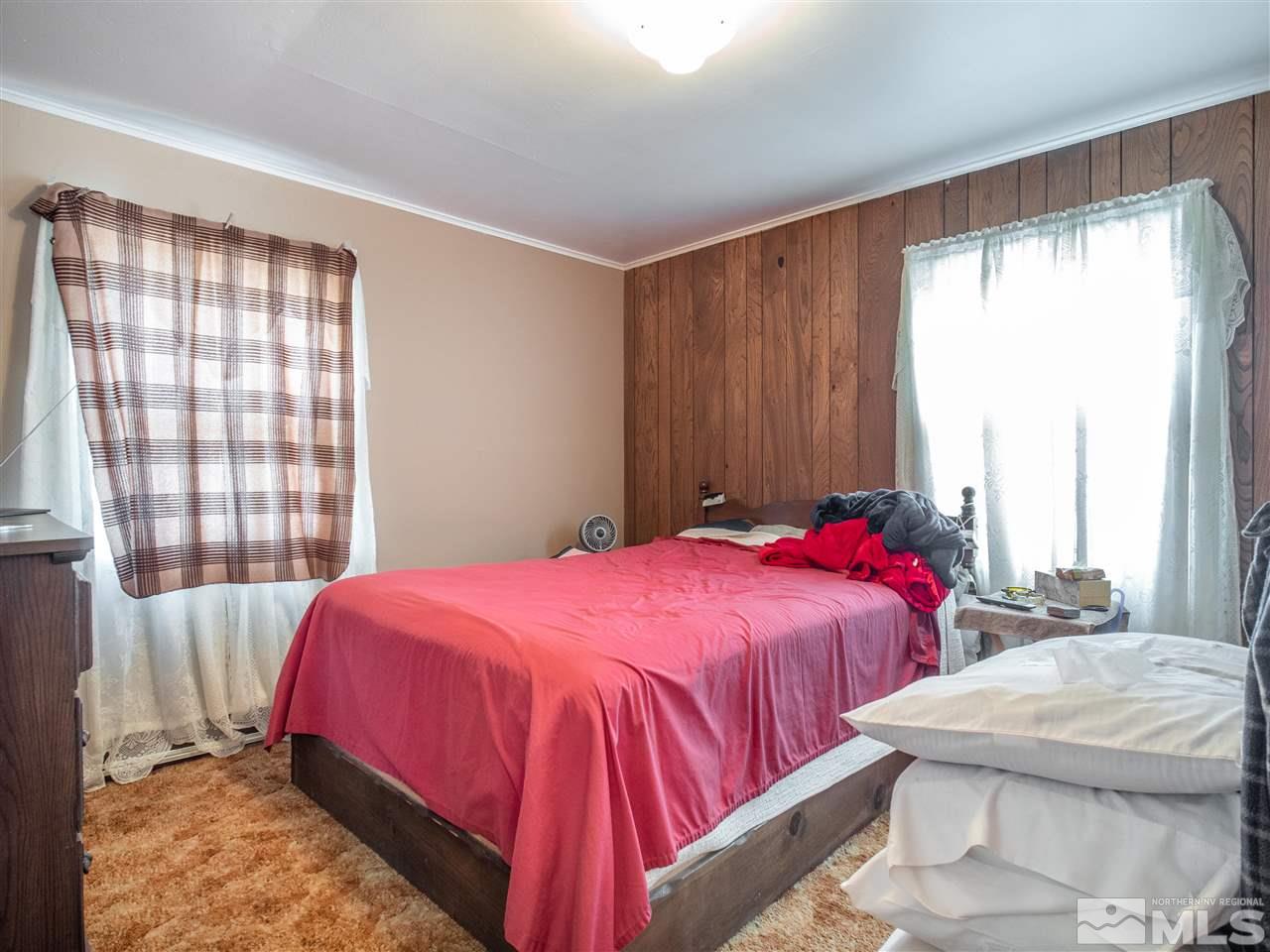 940 Wilkinson Avenue Reno, NV 89502 - Photo 20 of 29 a bedroom with a bed and window