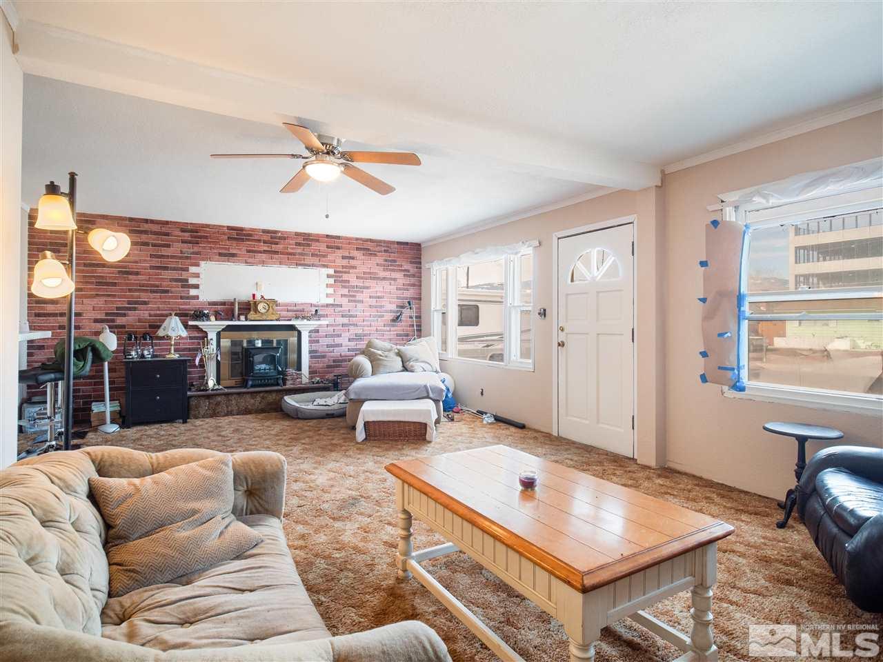 940 Wilkinson Avenue Reno, NV 89502 - Photo 10 of 29 a living room with furniture and a window