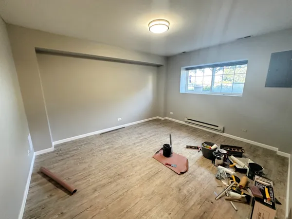 a room with a bed and a window