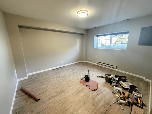 a room with a bed and a window