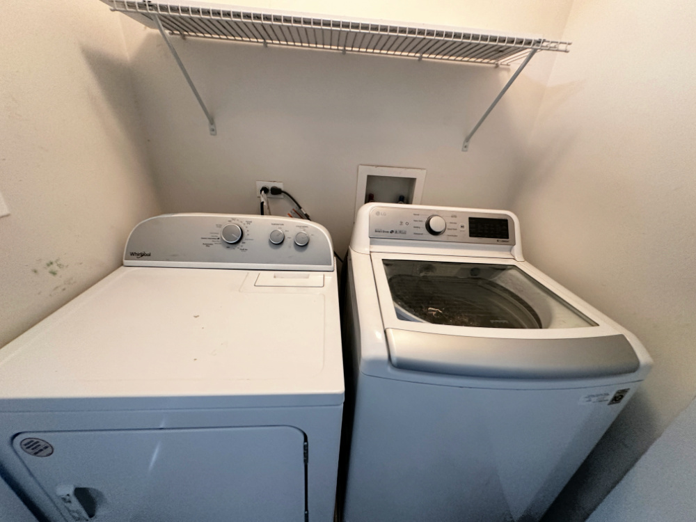 924 Clover Lane, Unit 1 Pingree Grove, IL 60140 - Photo 9 of 15 a utility room with dryer and washer