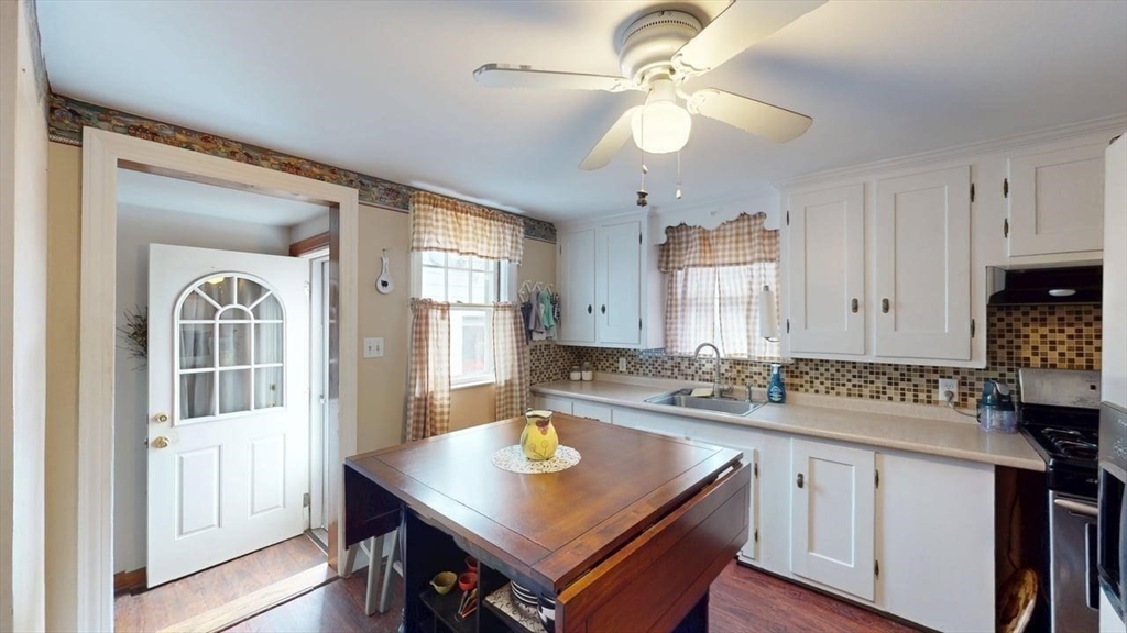 14 Jones Avenue Pawtucket, RI 02861 - Photo 20 of 32 a kitchen with a counter space cabinets and appliances