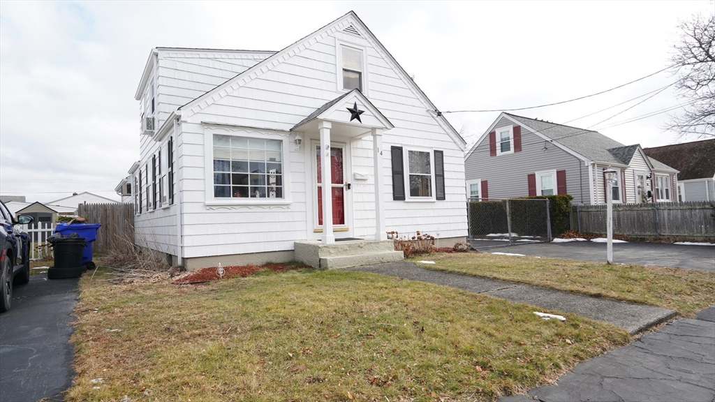 14 Jones Avenue Pawtucket, RI 02861 - Photo 2 of 32 a view of a white house with a yard and sitting space