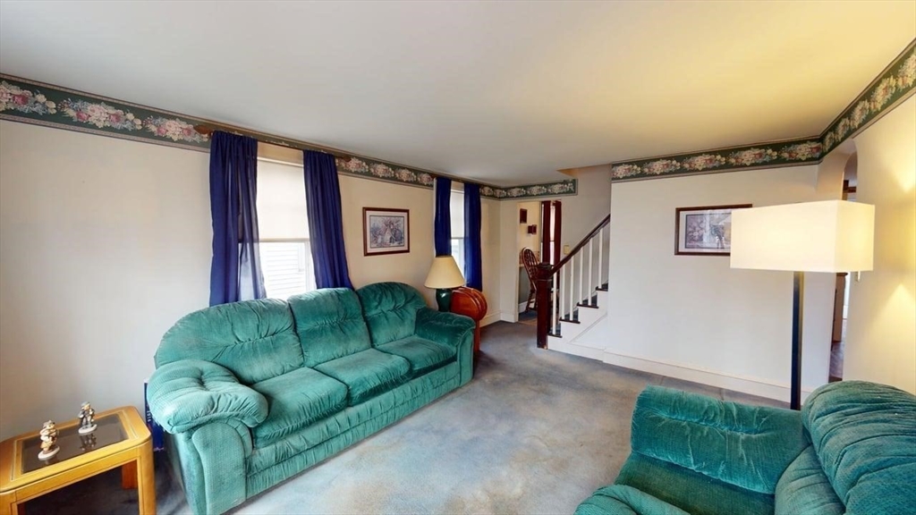 14 Jones Avenue Pawtucket, RI 02861 - Photo 23 of 32 a living room with furniture and a window