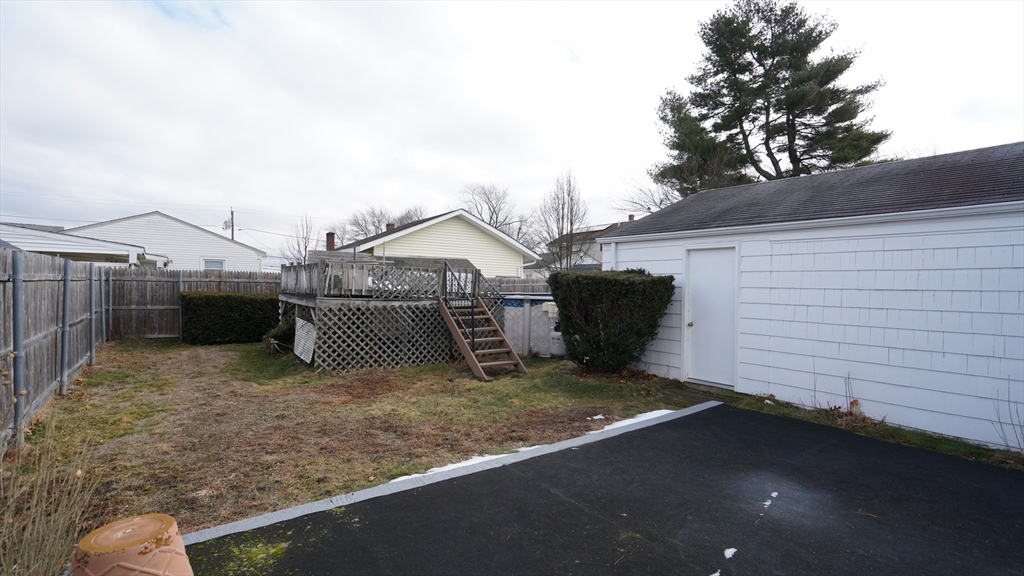 14 Jones Avenue Pawtucket, RI 02861 - Photo 28 of 32 a view of a house with a fence