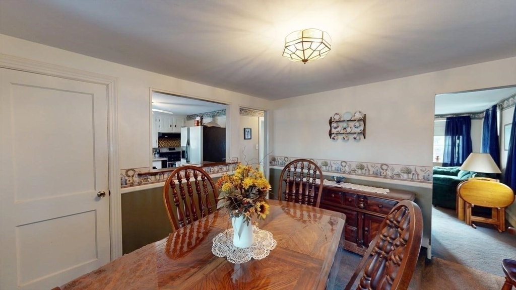 14 Jones Avenue Pawtucket, RI 02861 - Photo 9 of 32 a view of a dining room with furniture