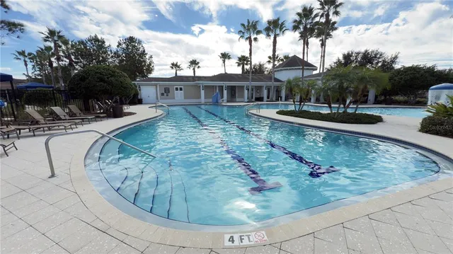 a view of a house with swimming pool