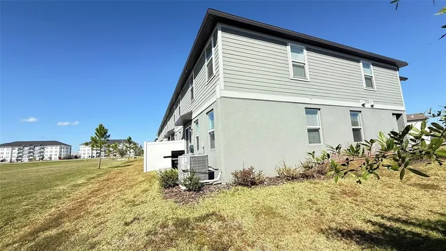 a house view with a backyard space