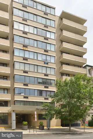 a view of a tall building from a window
