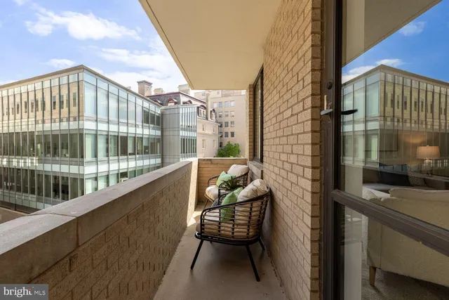 a view of balcony with a potted plant