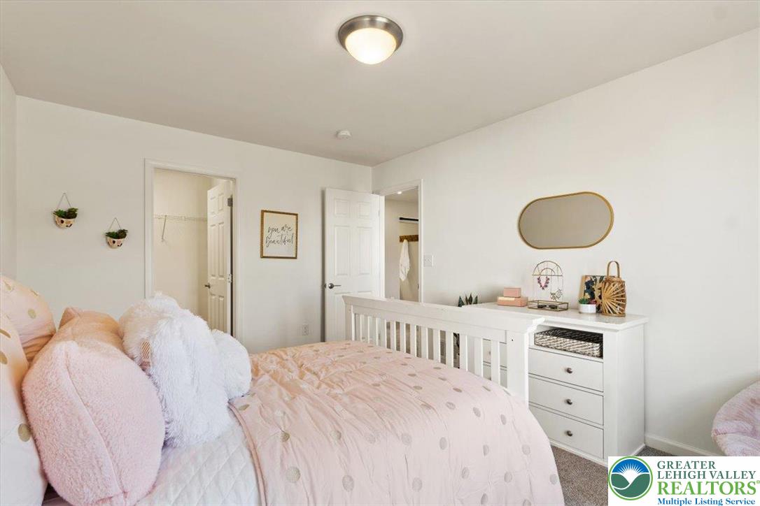 77 Tumble Creek Road, Unit 14 Easton, PA 18042 - Photo 29 of 33 Bedroom *Photos are of a previously built model home. Finishes, features, and options may vary*