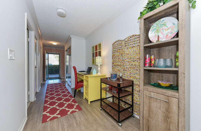 353 Highway 1, Unit A108 Jupiter, FL 33477 - Photo 16 of 36 a dining room with furniture and a rug