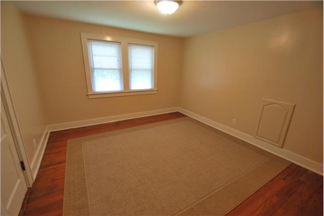 332 Jackson Road Portland, TN 37148 - Photo 8 of 9 Bedroom #3 has original hardwood and large cedar lined closert