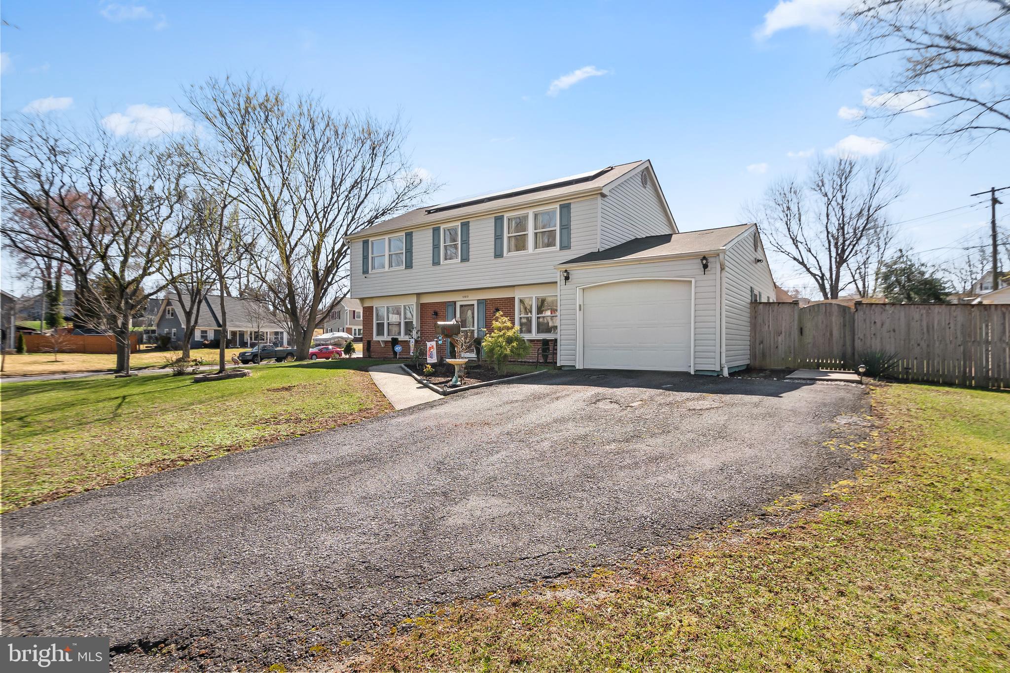 12613 Knowledge Lane Bowie, MD 20715 - Photo 1 of 32 a view of a house with a yard
