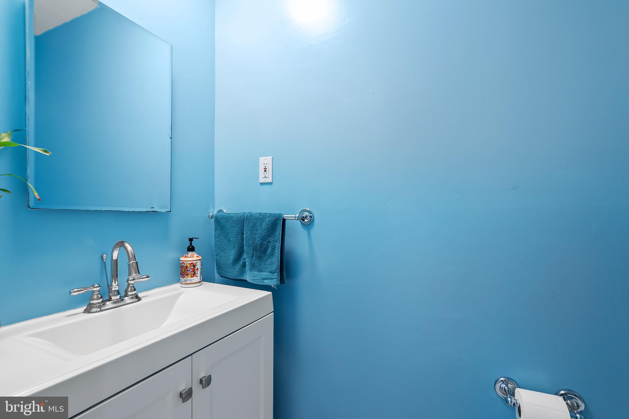 12613 Knowledge Lane Bowie, MD 20715 - Photo 16 of 32 a bathroom with a sink and a mirror