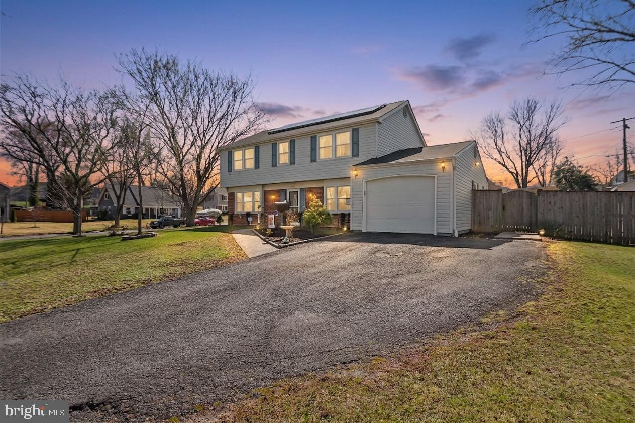 12613 Knowledge Lane Bowie, MD 20715 - Photo 2 of 32 a view of a house with a yard