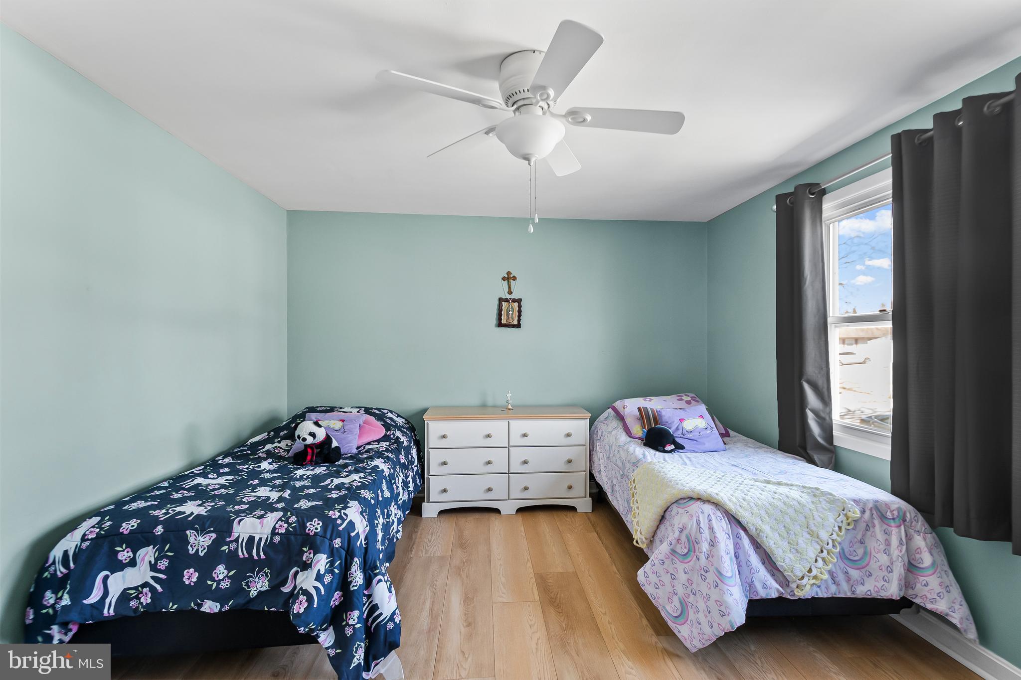 12613 Knowledge Lane Bowie, MD 20715 - Photo 22 of 32 a bedroom with a bed and a window