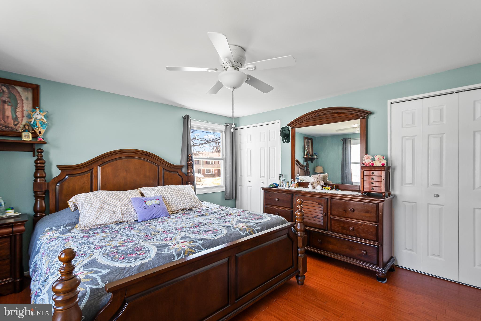 12613 Knowledge Lane Bowie, MD 20715 - Photo 24 of 32 a bedroom with a bed and a dresser