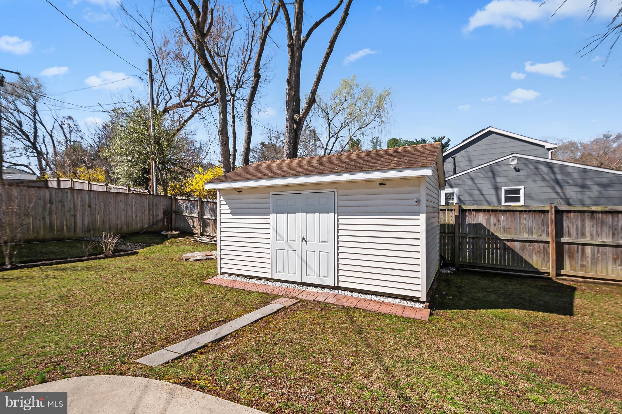 12613 Knowledge Lane Bowie, MD 20715 - Photo 30 of 32 a front view of a house with a yard