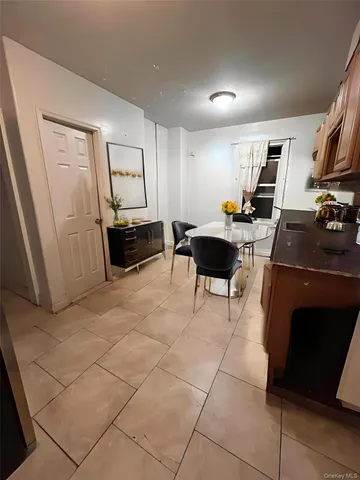 a view of a workspace with furniture