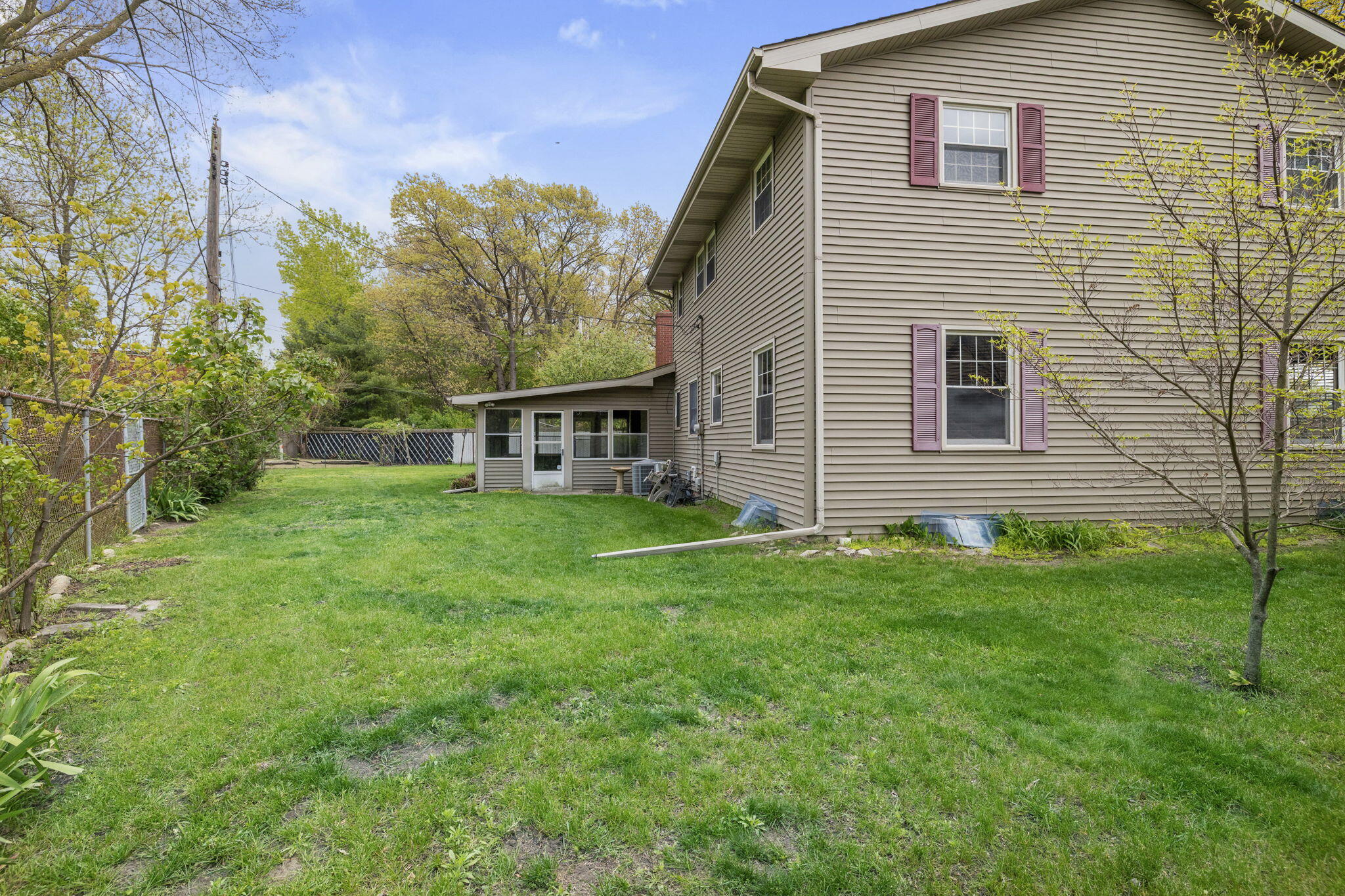 218 West 38th Court Griffith, IN 46319 - Photo 23 of 23 a view of a house with a backyard