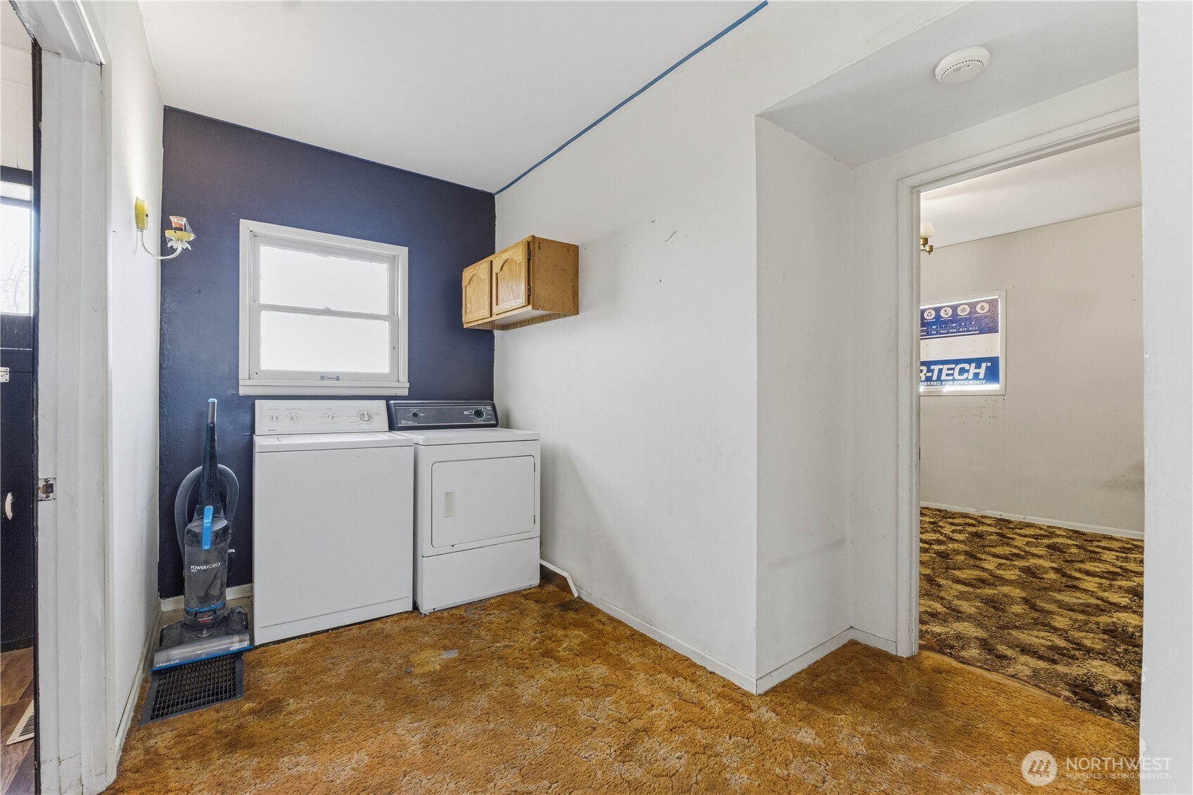 1248 South Mission Street Wenatchee, WA 98801 - Photo 4 of 22 a view of a storage & utility room with a sink