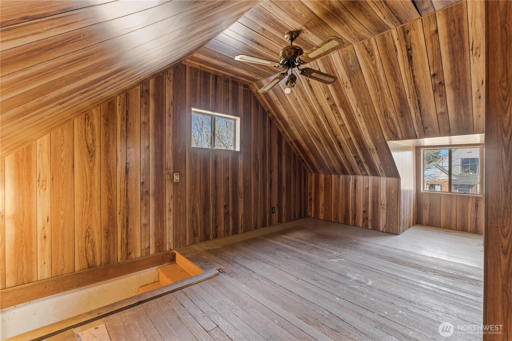 1248 South Mission Street Wenatchee, WA 98801 - Photo 10 of 22 an empty room with wooden floor and windows