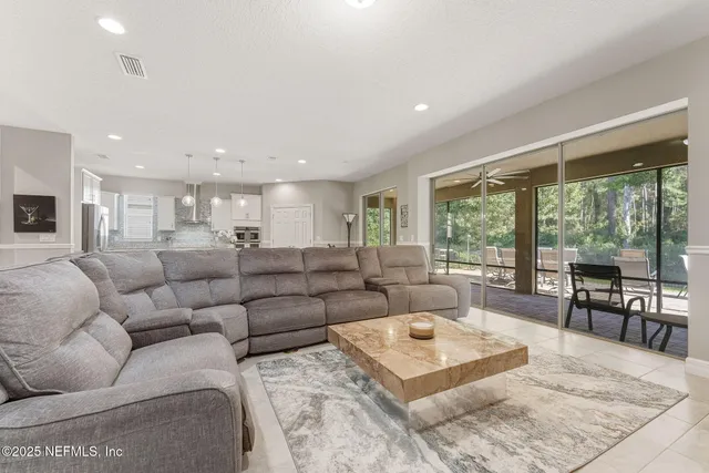a living room with furniture and a couch