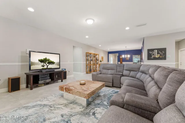 a kitchen with cabinets table and chairs