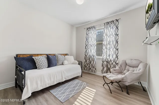 a bathroom with a sink toilet and a mirror