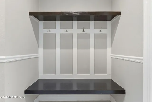 an aerial view of a house with a garden