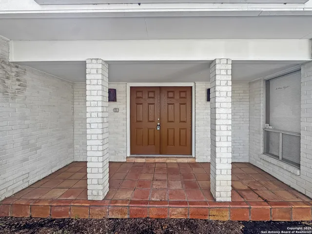 a view of the door of the house