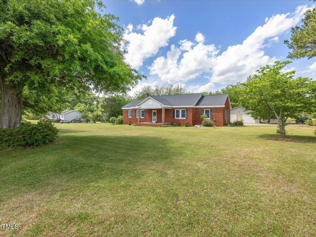 10186 Highway 97 Middlesex, NC 27557 - Photo 1 of 70 a house view with garden space