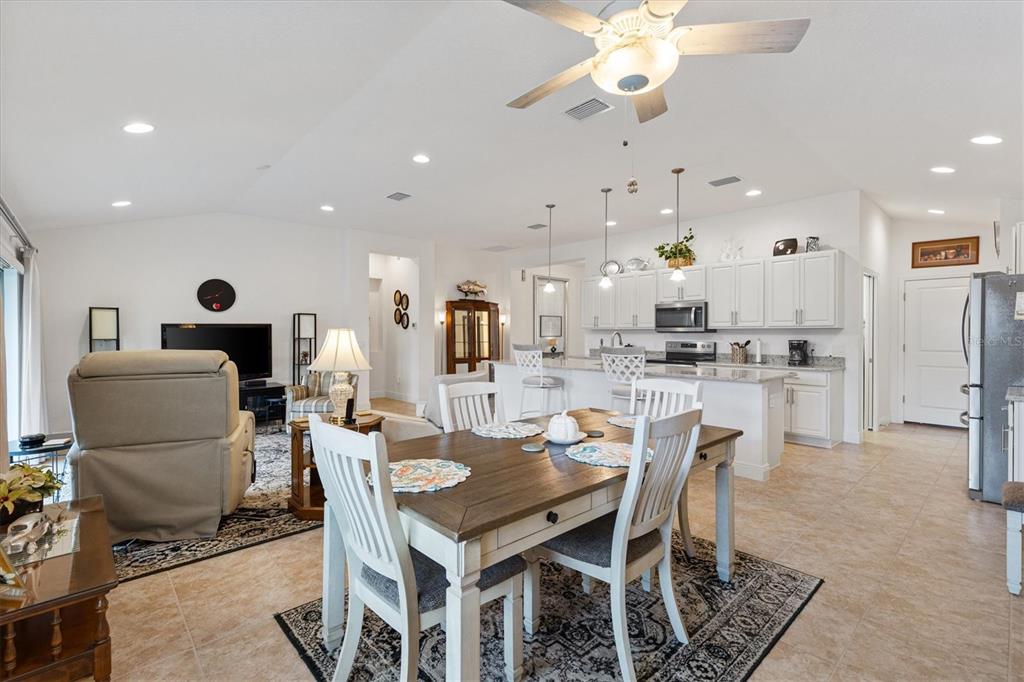 10404 Silver Maple Avenue Oxford, FL 34484 - Photo 15 of 41 a view of a dining room with furniture
