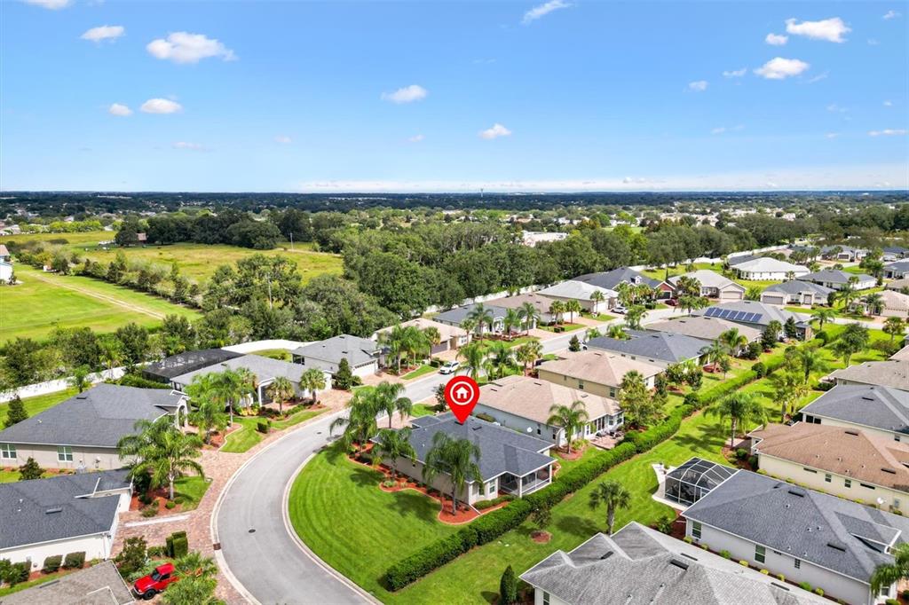 10404 Silver Maple Avenue Oxford, FL 34484 - Photo 36 of 41 an aerial view of residential houses with outdoor space