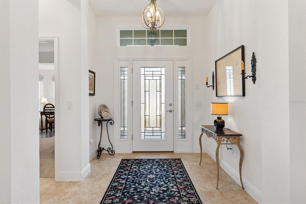 10404 Silver Maple Avenue Oxford, FL 34484 - Photo 5 of 41 a view of a entryway door with a rug