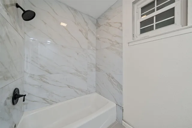 a bathroom with a bathtub