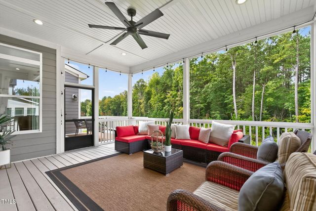 a kitchen with a table and chairs in it