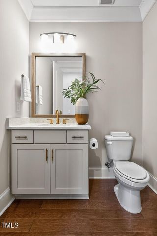 a spacious bedroom with a large bed and a large window