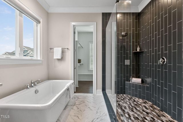 a kitchen with stainless steel appliances granite countertop a stove sink and cabinets