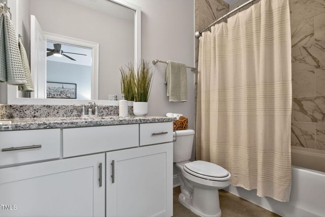 a view of a chair in wooden deck