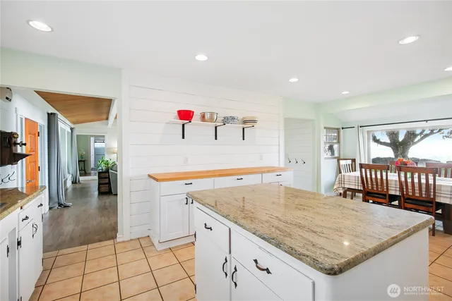 a kitchen with a stove and a sink