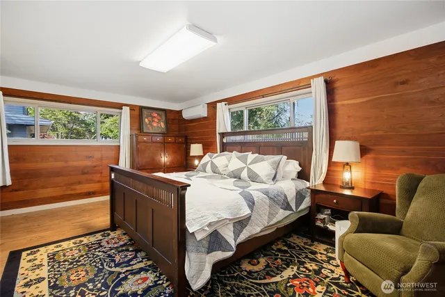 a bed room with a bed and a couch