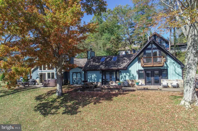 a front view of a building with a yard