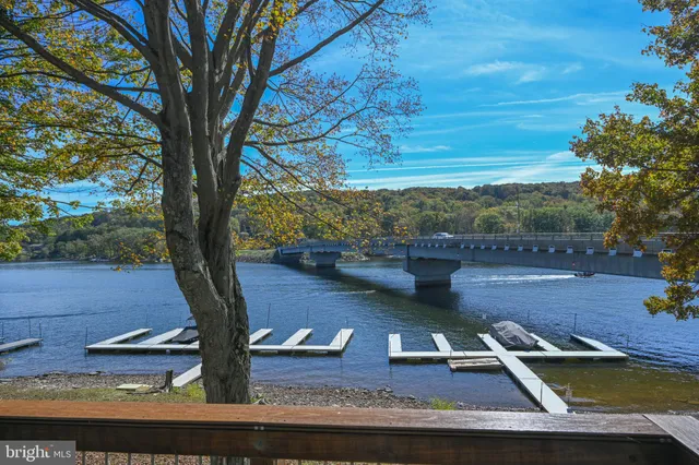 a view of swimming pool with seating space